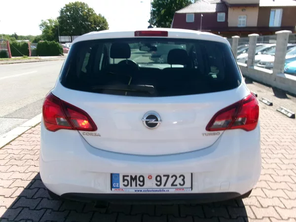 Opel Corsa 1,4T KLIMA TEMP ALU ČR - foto 6