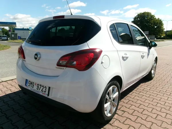 Opel Corsa 1,4T KLIMA TEMP ALU ČR - foto 7