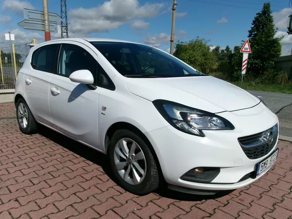 Opel Corsa 1,4T KLIMA TEMP ALU ČR - foto 8