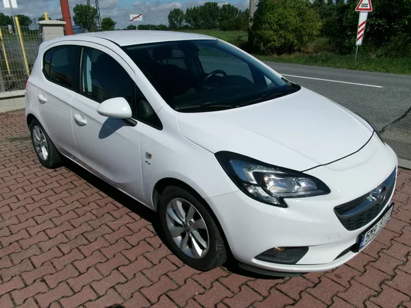 Opel Corsa 1,4T KLIMA TEMP ALU ČR - foto 9
