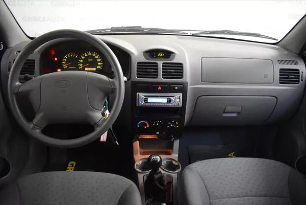 Kia Rio 1,3 i SUPER STAV,PO SERVISU - foto 17