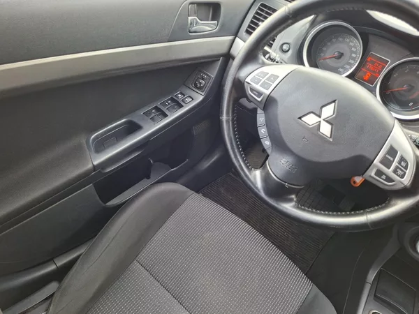 Mitsubishi Lancer 1.8i 105kW - foto 11