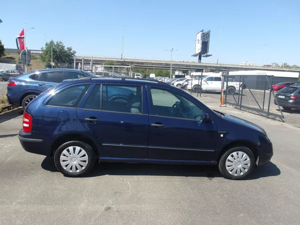 Škoda Fabia 1,4i AUTOMAT !!! KLIMA,PARKSEN - foto 9