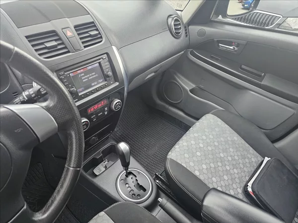 Suzuki SX4 1,6 VVTI 88KW STYLE AUTOMAT - foto 13