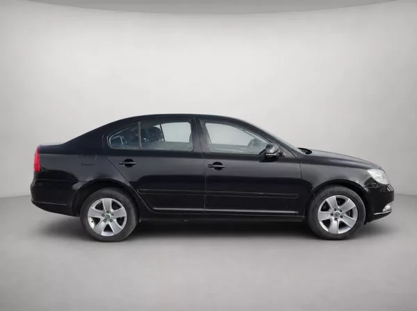 Škoda Octavia 1.6 TDi 77Kw Elegance - foto 8