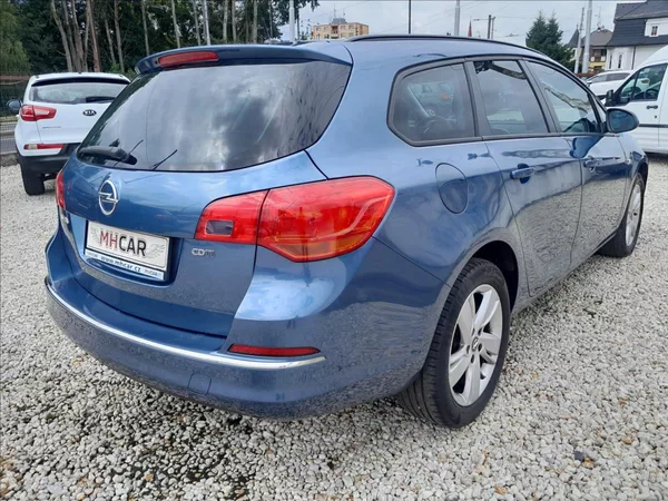 Opel Astra 1,6 TDCI 100kW SPORTS TOURER - foto 7
