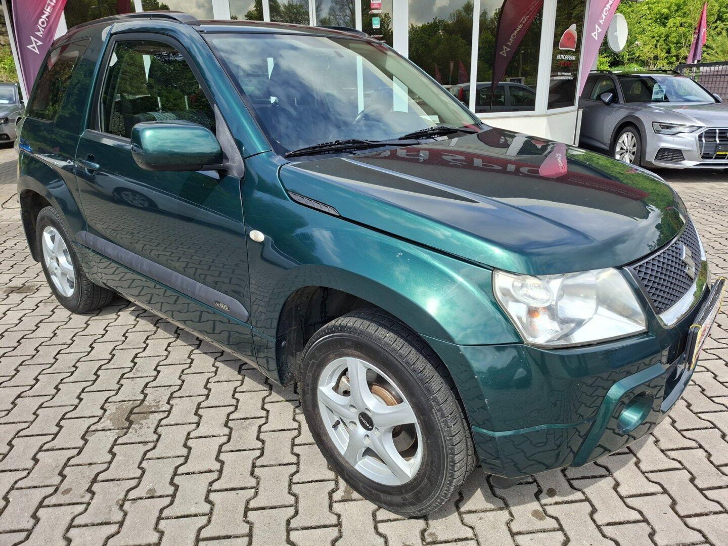Suzuki Grand Vitara 1.6i 78kW 4x4 -T.ZAŘ-4 MÍSTNÉ